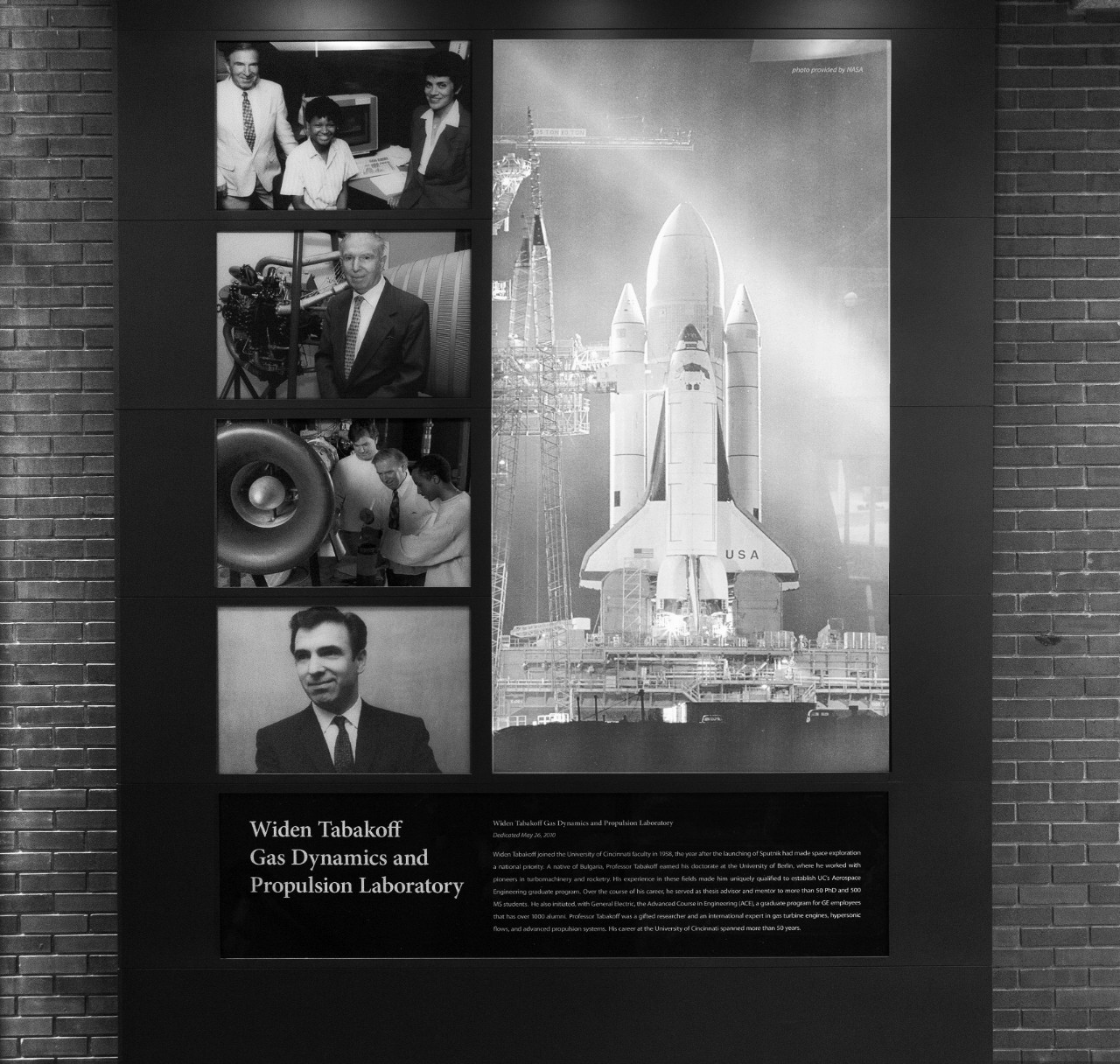 Wall plaque in Rhodes Hall Lobby commemorating Dr. Tabakoff