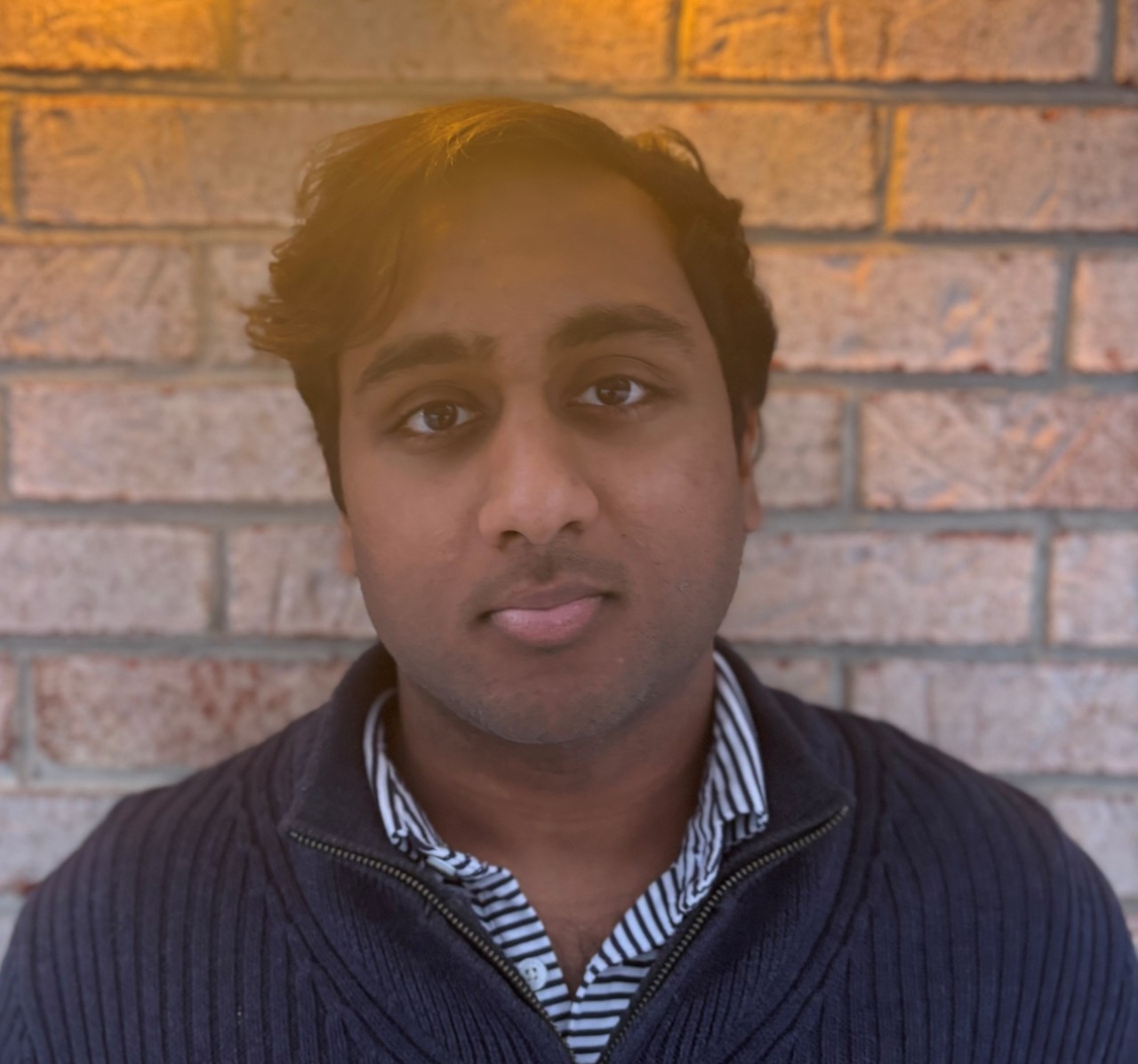 headshot of Arjun Dheenan