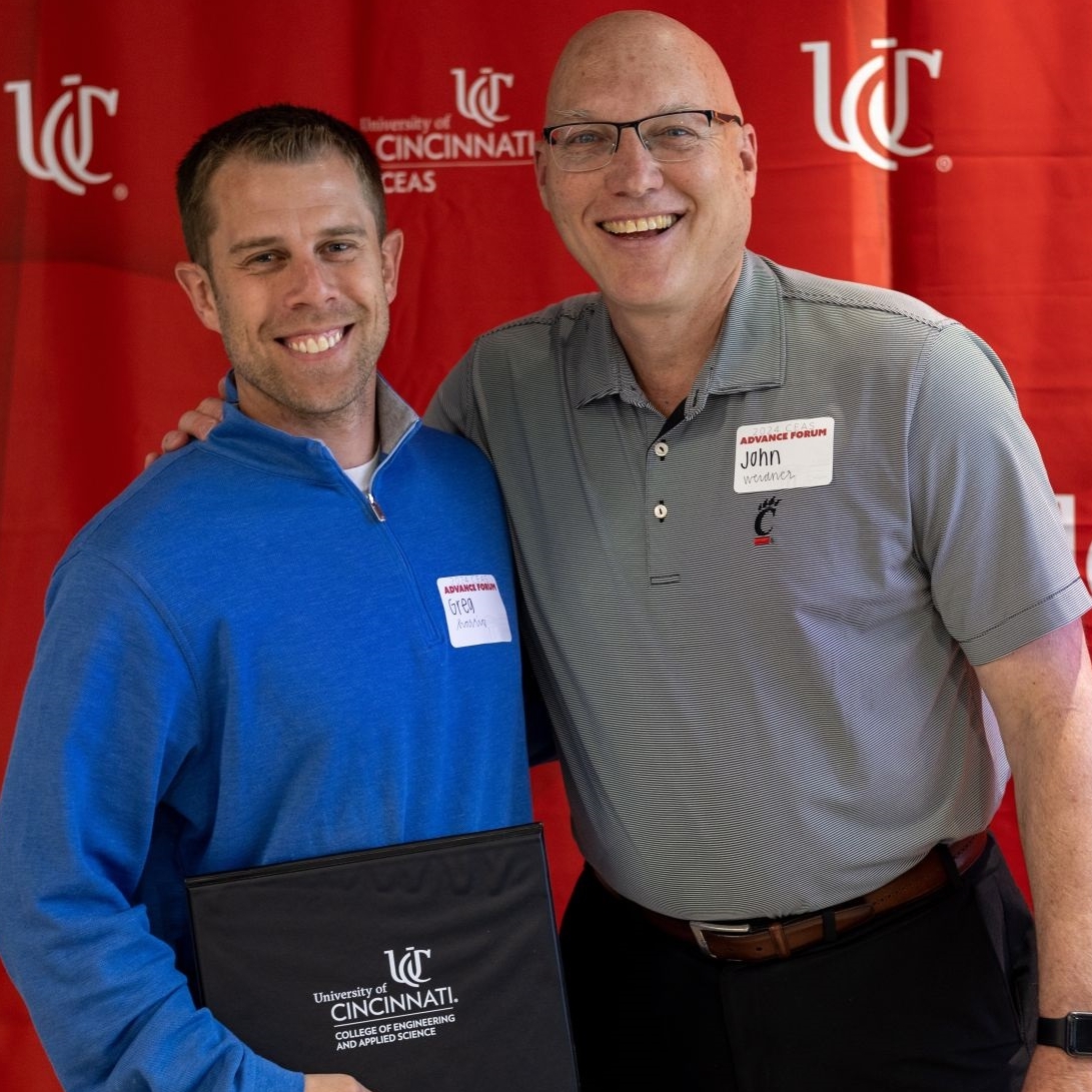 Greg Harris poses with John Weidner